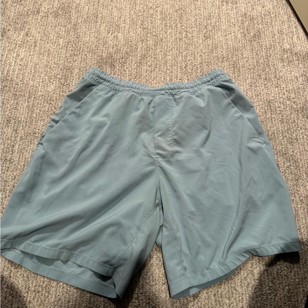 Men's Lululemon Pace Breaker  Light Blue Shorts athletic shorts 7 inch inseam.